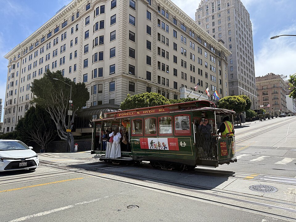 How do you ride the cable cars in San Francisco?