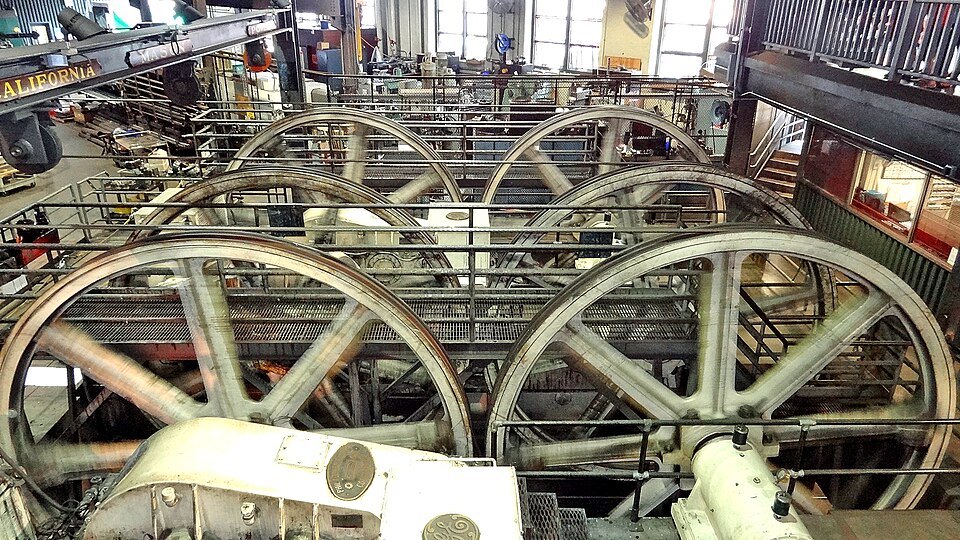 The great winding wheels that drive the cables, inside the Cable Car Museum