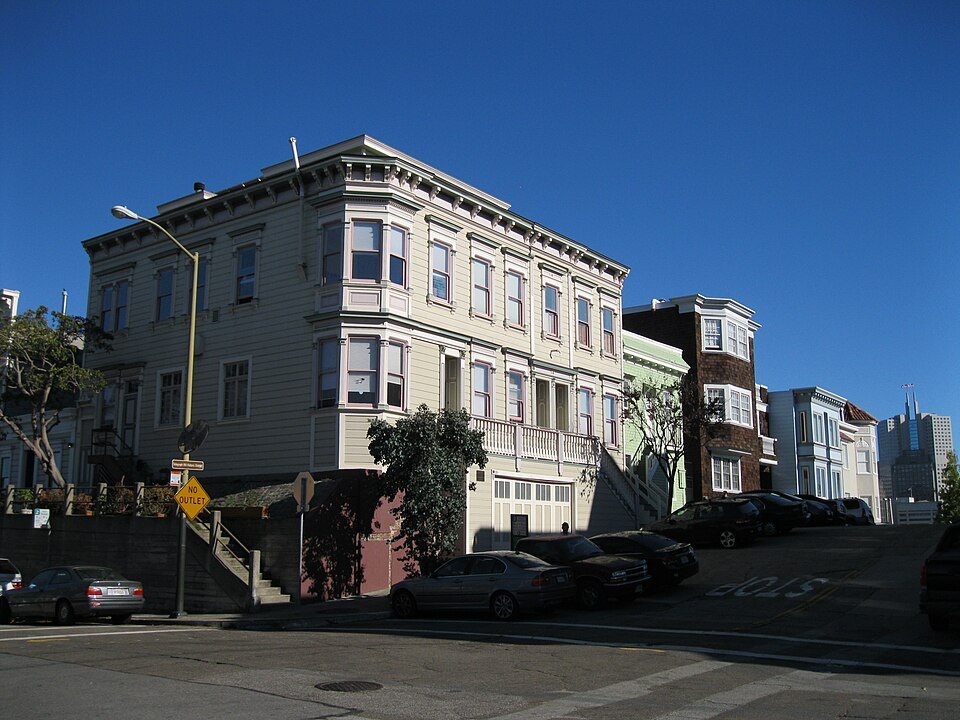 Old bay-windowed apartment houses on the corner of Montgomery Street on Telegraph Hill