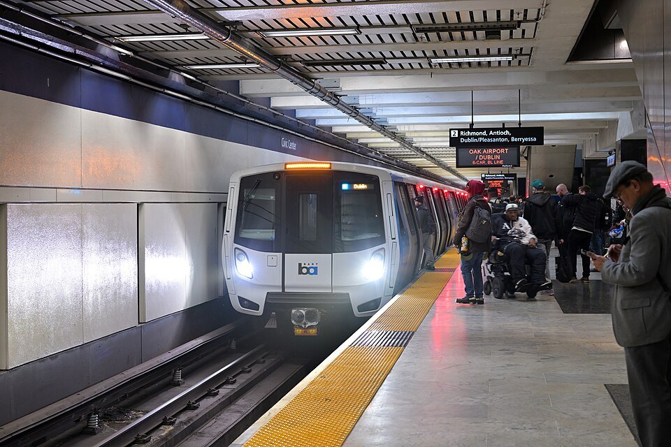 A BART train pulling into Civic Center station under Market Street