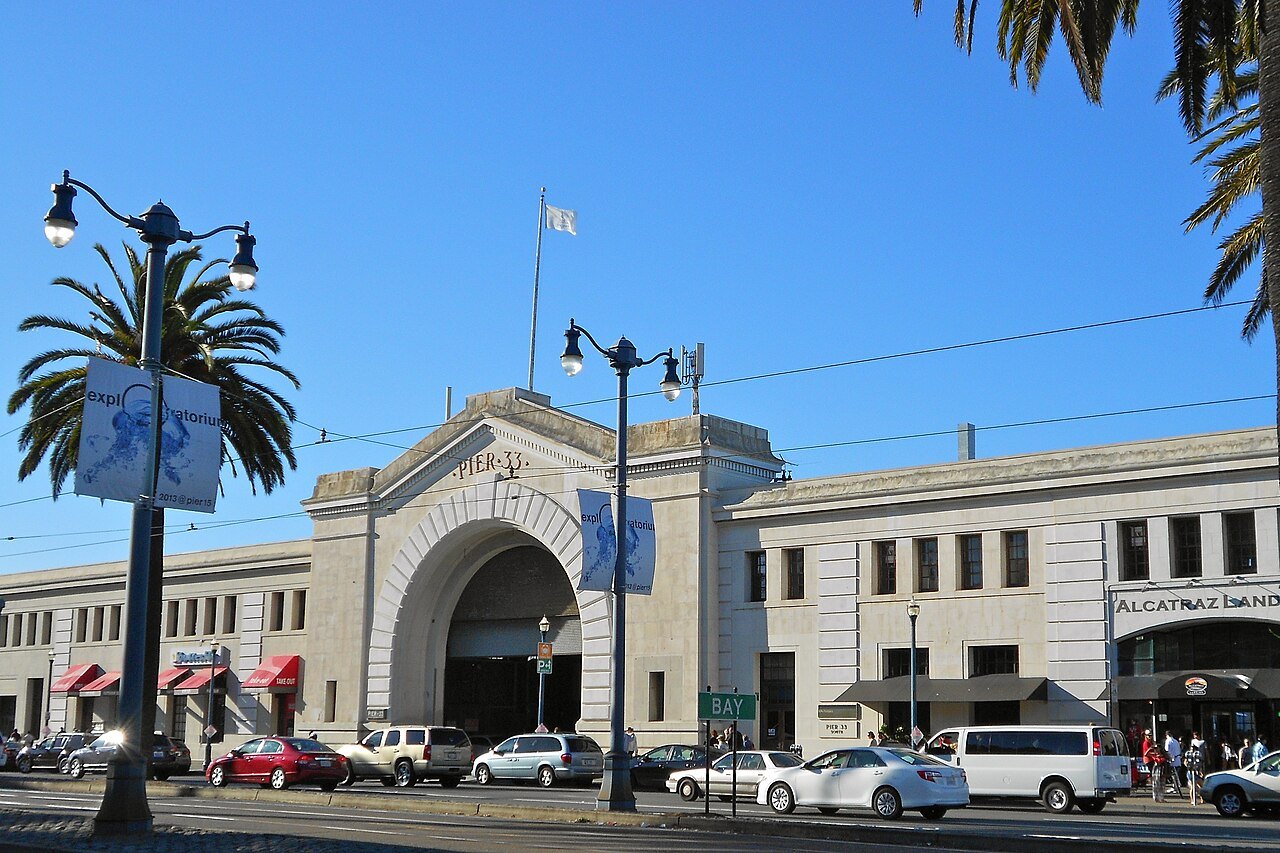 The arched entrance of Pier 33 on the Embarcadero, where the Alcatraz ferries leave