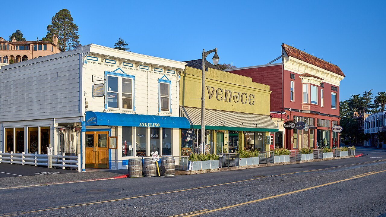 Painted shopfronts along Bridgeway, the waterfront street of Sausalito
