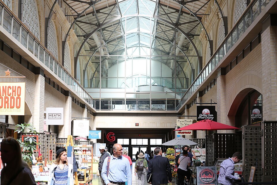 The skylit arcade of the Ferry Building marketplace, crowded with shoppers