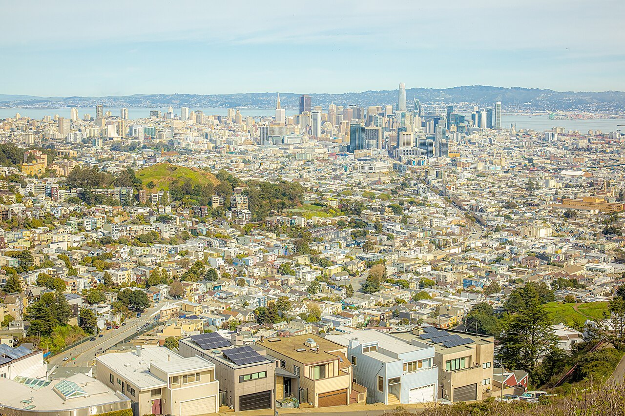 The city from Twin Peaks: rooftops running down to downtown and the bay