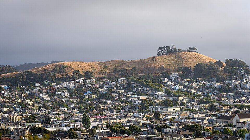 Bernal Heights' bare summit above the houses of the southern neighborhoods