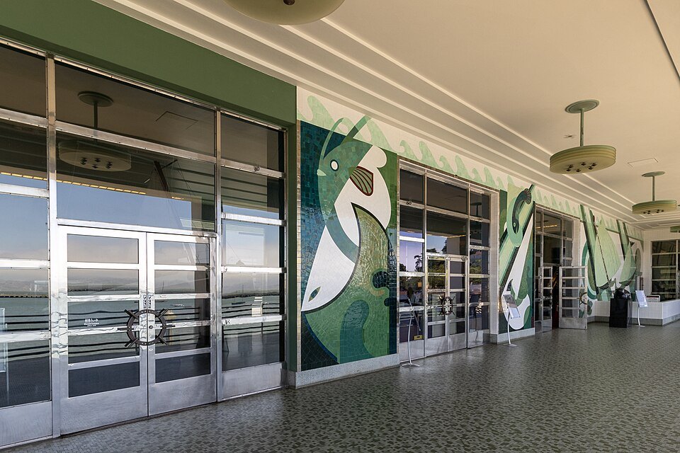 Sea-green murals on the balcony of the Maritime Museum at Aquatic Park