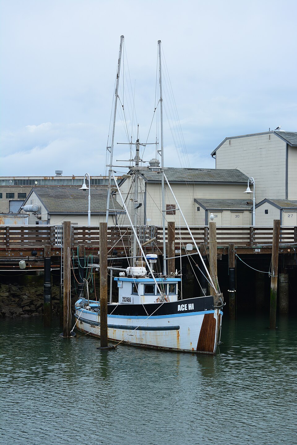 A fishing boat moored in the inner lagoon at Fisherman's Wharf