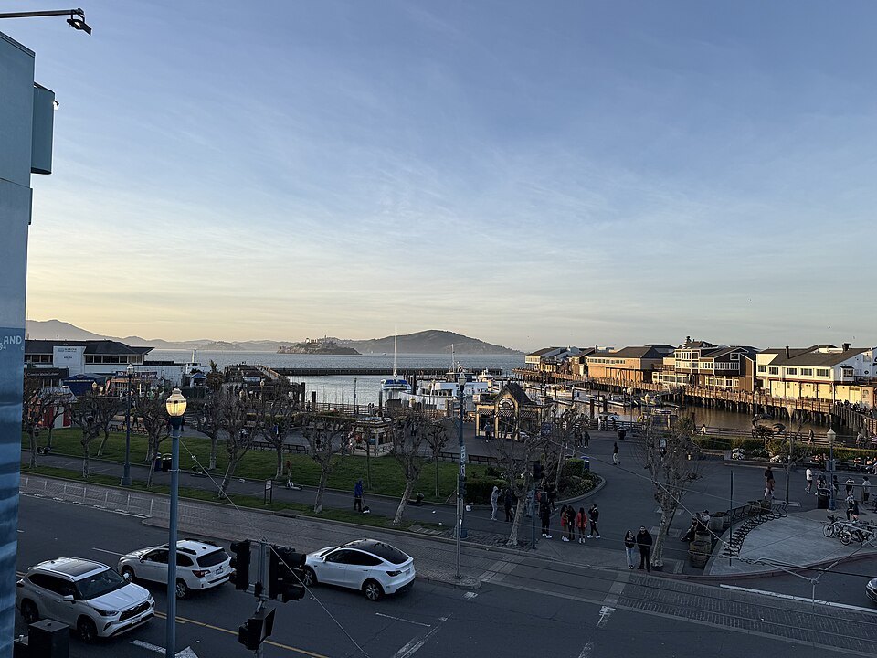 Pier 39 and the waterfront in the evening light, Alcatraz out in the bay