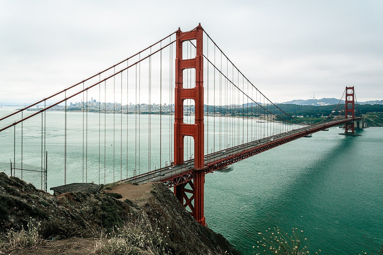 The Golden Gate Bridge from the Marin Headlands, the city across the strait