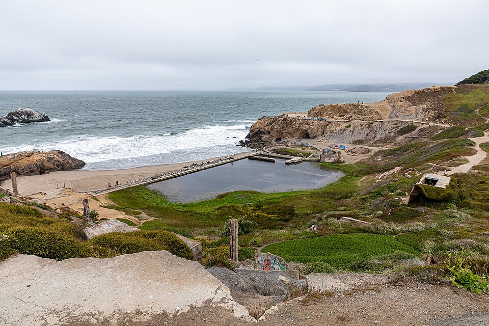 The flooded pools of the Sutro Baths and the beach beside them
