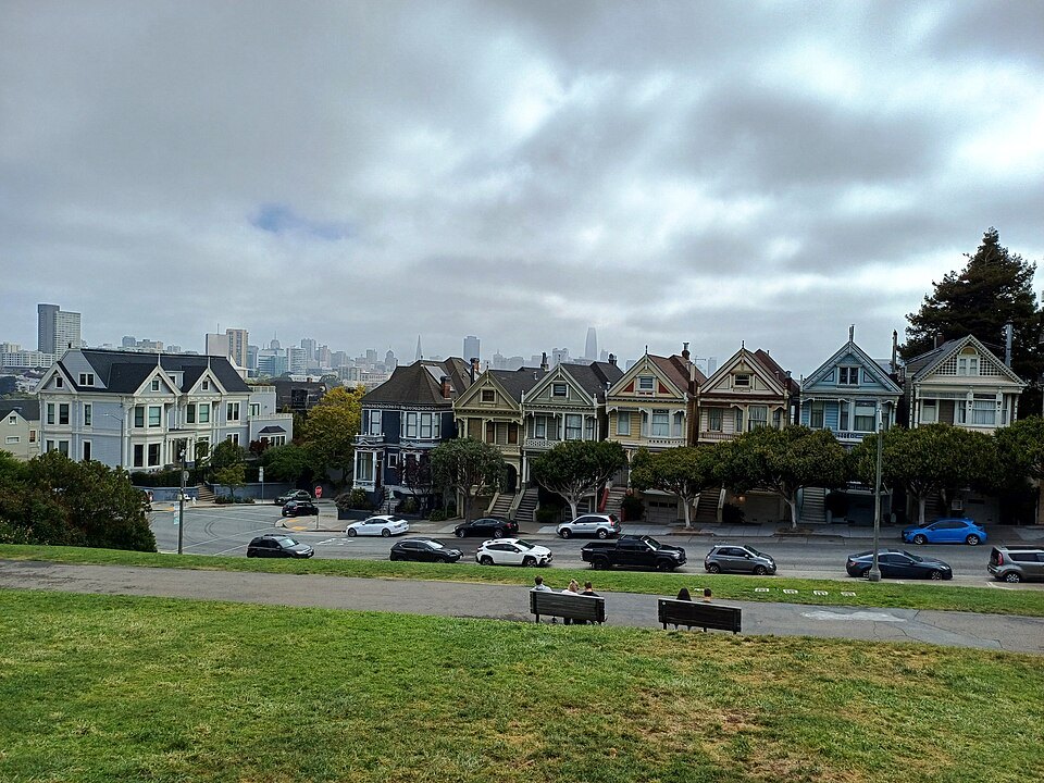 The Painted Ladies and the downtown skyline from the lawn of Alamo Square