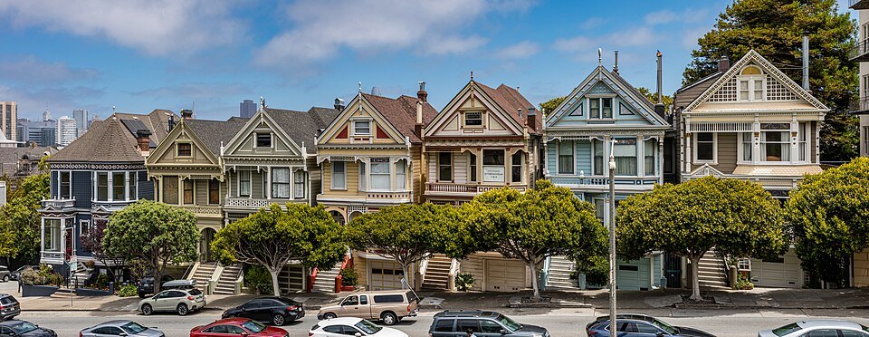 The row of Painted Ladies on Steiner Street, their gables in a line