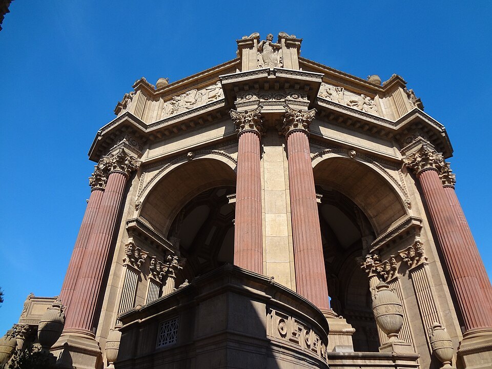 The rotunda's arches and columns rising against a blue sky