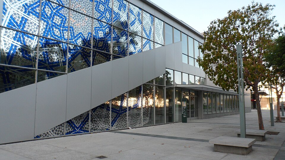 The Yerba Buena Center for the Arts, its glass wall patterned in blue